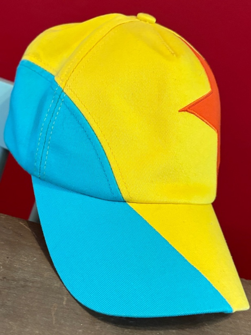 Disney exclusive Pixar Cap in Yellow, Aqua, and Orange like new